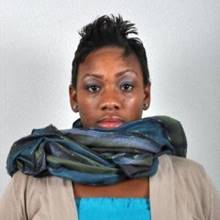 Applicant photograph with scarf covering chin.
